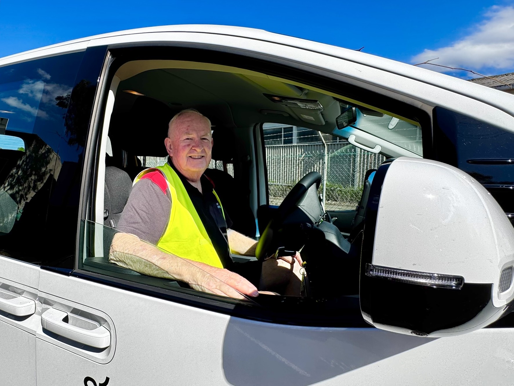 Volunteer driver Graeme beside his namesake wheelchair-accessible Hyundai Staria, Grae Grae