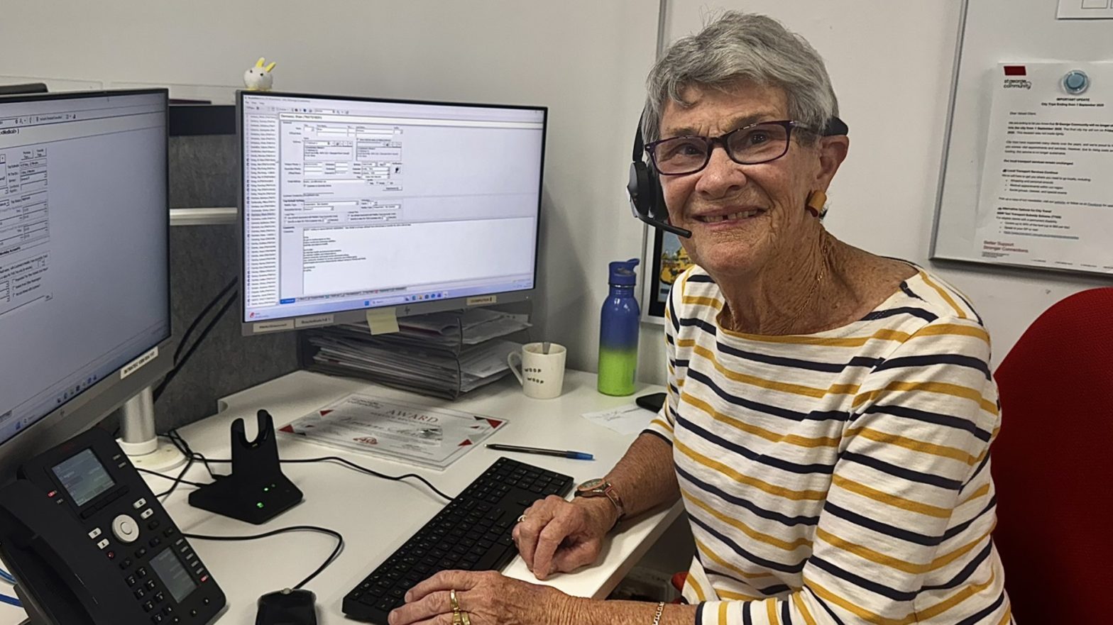 Viv volunteering in the St George Community office.