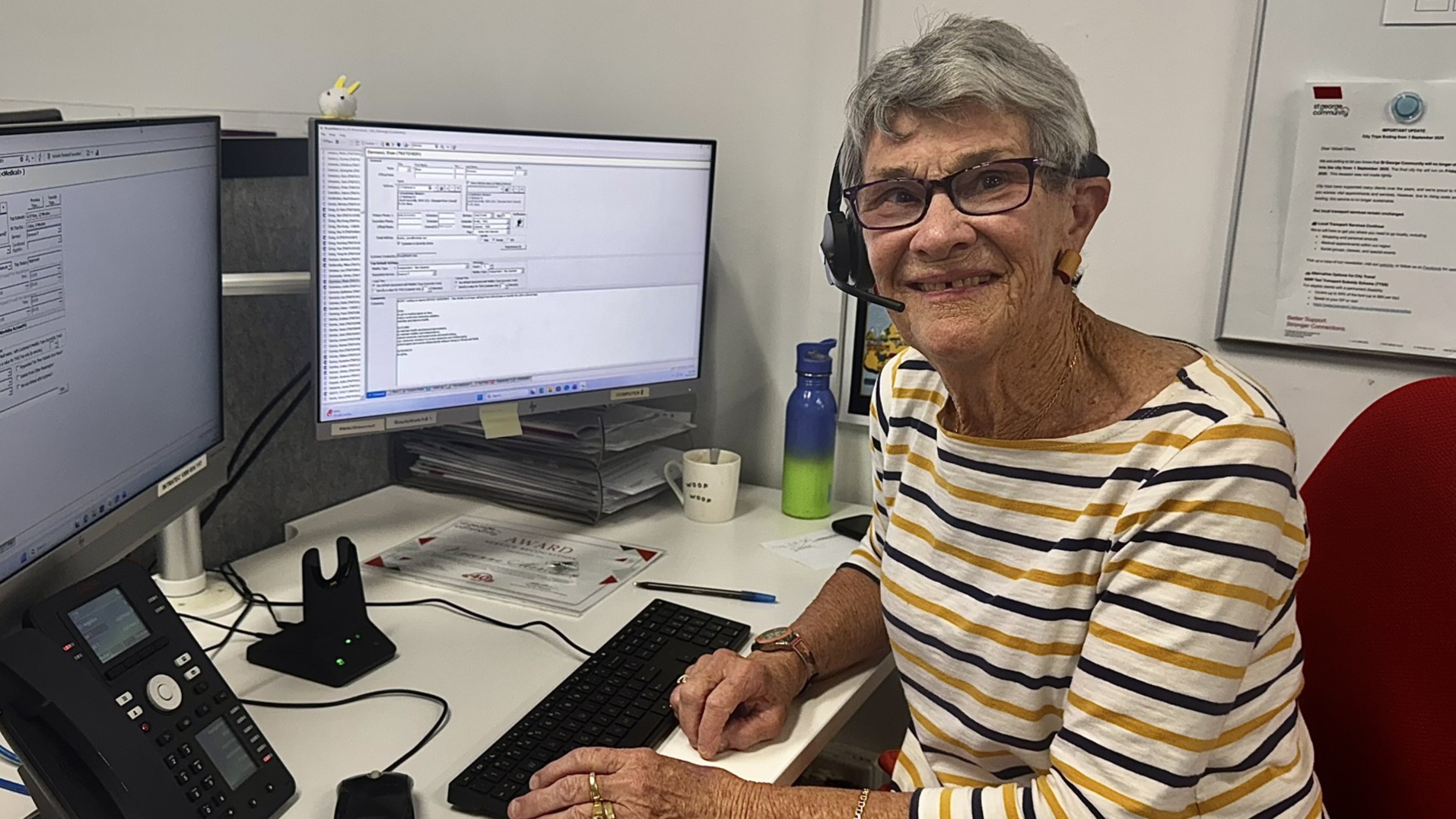 Viv volunteering in the St George Community office.